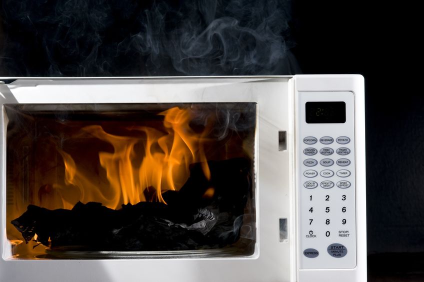 What should you never put in a microwave?